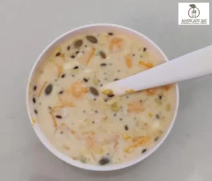 A bowl of Sweet and healthy mango chia pudding. Can be used for weight loss.