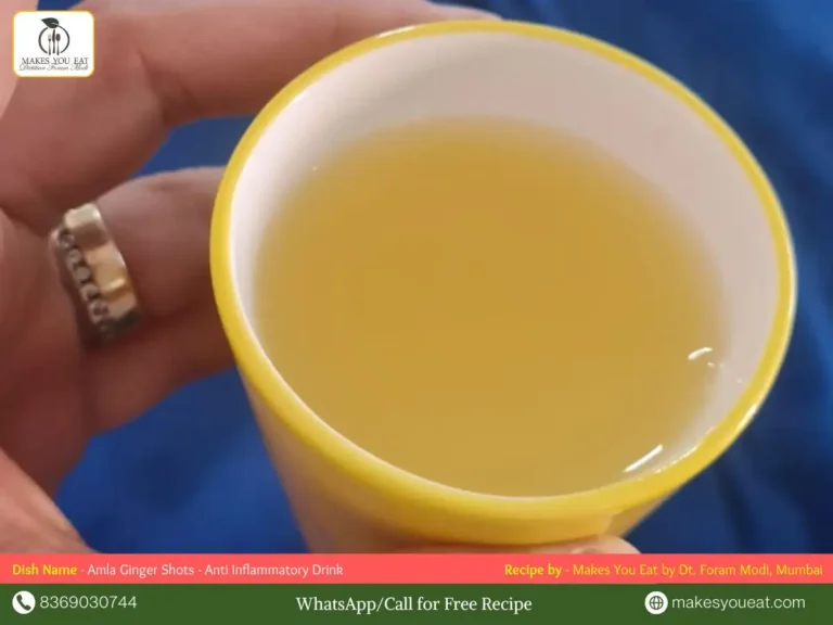 A cup of Amla Ginger Shots.