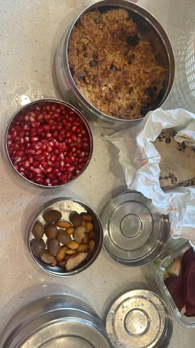 Tiffin boxes with Pomegranate, salad, dryfruits.