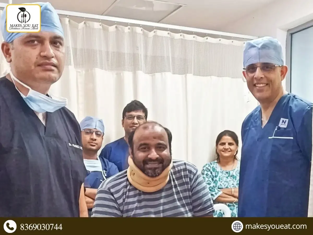 Paras bhai with doctors at hospital after spine surgery.